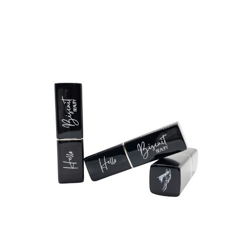 Hello Biscuit Beauty Backwoods Matte Lipstick in muted mocha. Black lipstick tube with silver accents and logo.