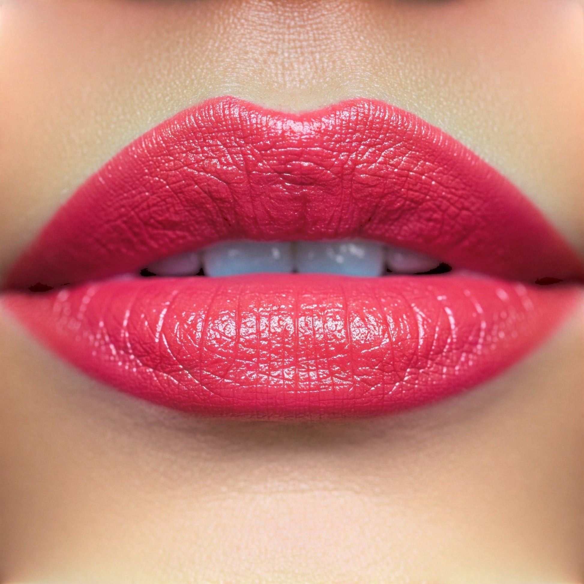 Hello Biscuit Beauty Kiss This bright red crème lipstick with a luminous finish and hydrating formula.