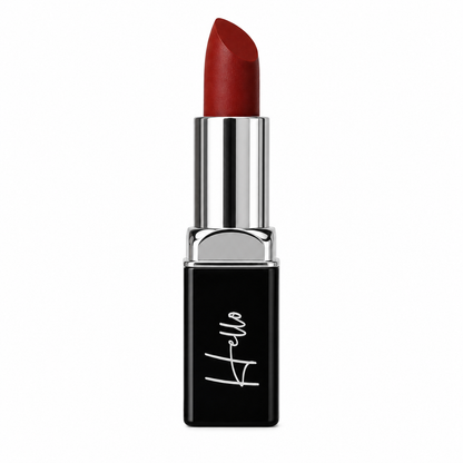 An open tube of Hello Biscuit Beauty My Maria matte lipstick rolled up to showcase the rich deep burnt red shade in its black casing with a white script logo on a clean white background