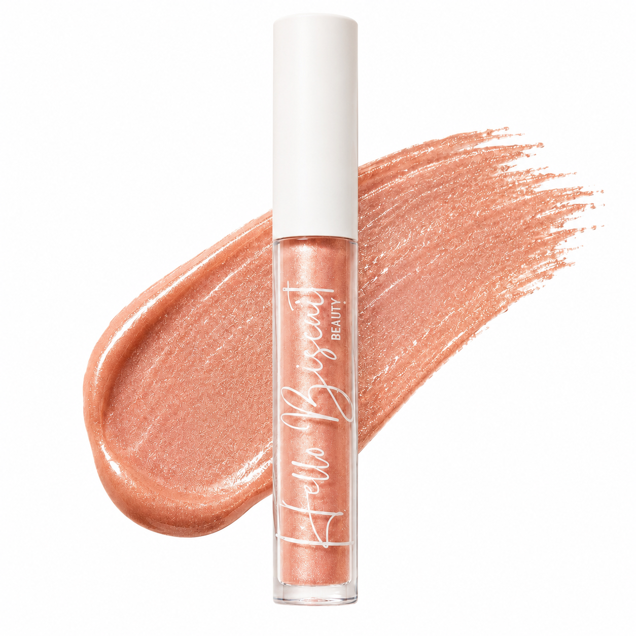 A clear tube of Hello Biscuit Beauty Palomino Sparkly Mocha Lip Gloss placed over a large thick mocha liquid makeup swatch infused with radiant pink shimmer